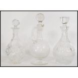 Three cut glass decanters to include two of bulbou