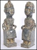 A pair of large unusual cast bronze African tribal