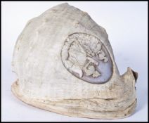 A 19TH CENTURY CAMEO CARVED LARGE CONCH SHELL