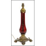 19TH CENTURY BRASS AND CRANBERRY GLASS TABLE LAMP