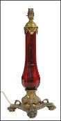 19TH CENTURY BRASS AND CRANBERRY GLASS TABLE LAMP