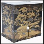 A JAPANESE CHINOSERIE 19TH CENTURY BLACK LACQUER CABINET