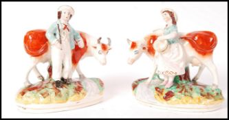 19TH CENTURY VICTORIAN STAFFORDSHIRE CREAMWARE FIGURINES OF COWS