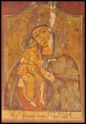 A 19TH CENTURY RELIGIOUS PAINTED WOODEN ICON - MARY & CHRIST