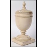 AN EDWARDIAN LARGE WOODEN PAINTED CAMPANA URN AND LID