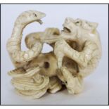 JAPANESE MEIJI PERIOD IVORY NETSUKE DRAGON FIGHTING WITH SNAKE AND RAT