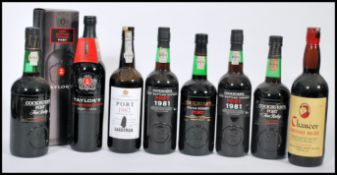 COLLECTION OF 8 BOTTLES OF VINTAGE PORT TO INCLUDE SANDEMANS, COCKBURNS ETC