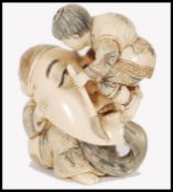JAPANESE MEIJI PERIOD CARVED IVORY NETSUKE - THEATRICAL MASKS & ACTORS