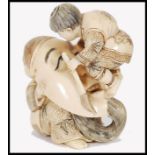 JAPANESE MEIJI PERIOD CARVED IVORY NETSUKE - THEATRICAL MASKS & ACTORS