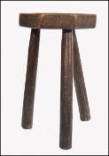 EARLY 19TH CENTURY COUNTRY ELM WOODEN MILKING STOOL