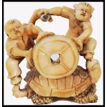 JAPANESE MEIJI PERIOD CARVED IVORY NETSUKE - LARGE TURTLE AND SAILORS