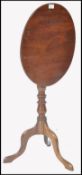 A 19TH CENTURY GEORGE III MAHOGANY TILT TOP WINE TABLE