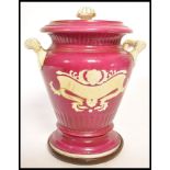 A large 19th century twin handled chemists apothecary jar by Samuel Alcock in red  ground with white