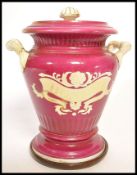 A large 19th century twin handled chemists apothecary jar by Samuel Alcock in red  ground with white