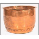 A large 19th century Victorian copper wash bin copper / planter of industrial size having a