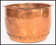 A large 19th century Victorian copper wash bin copper / planter of industrial size having a