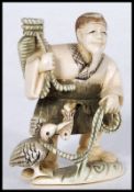 JAPANESE MEIJI PERIOD IVORY CARVED NETSUKE - FISHERMAN WITH BASKET