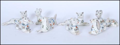 8 19TH CENTURY FRENCH FAIENCE PORCELAIN KNIFE RESTS IN THE FORM OF ANIMALS