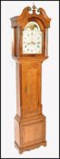 A GEORGE III OAK LONGCASE CLOCK BY JOHN DAY, WAKEF