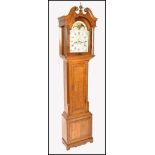 A GEORGE III OAK LONGCASE CLOCK BY JOHN DAY, WAKEF