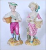 PAIR OF ROYAL WORCESTER FIGURINES ( 414 ) BY JAMES HADLEY