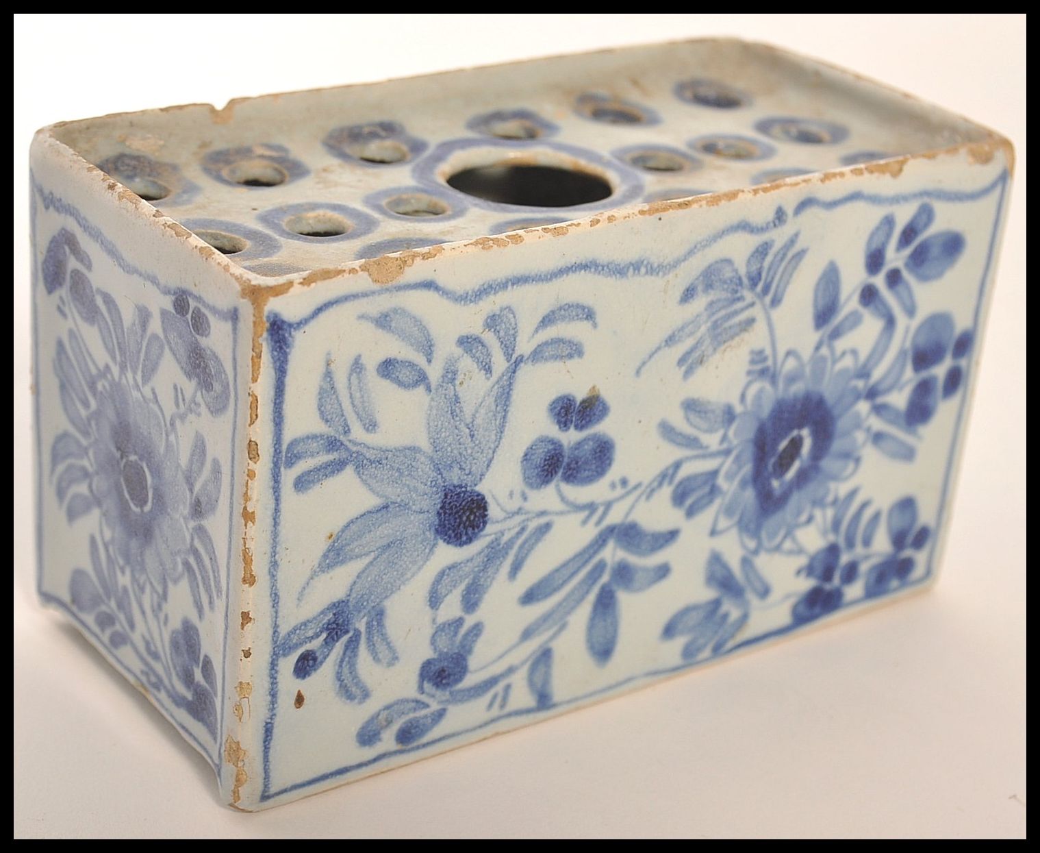 18TH CENTURY ENGLISH DELFT BLUE AND WHITE FLOWER BRICK