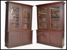 A PAIR OF VICTORIAN MAHOGANY AND LEADED GLASS LIBRARY BOOKCASES