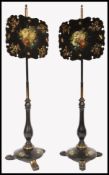 PAIR OF 19TH CENTURY REGENCY PAPIER MACHE BLACK LACQUERED POLE SCREENS