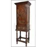 17TH CENTURY CARVED GEOMETRIC FRONTED SPICE CUPBOARD ON STAND