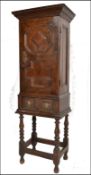 17TH CENTURY CARVED GEOMETRIC FRONTED SPICE CUPBOARD ON STAND