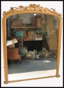 19TH CENTURY LARGE VICTORIAN GILTWOOD AND GESSO WORK ARCH MIRROR
