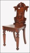 19TH CENTURY VICTORIAN ARMORIAL SOLID MAHOGANY HALL CHAIR