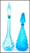 Empoli glass - ' Genie ' - A near matching pair of blue bottle decanters having knobbled design with