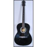 An ebonised 6 string Martin Smith full sized acoustic guitar with chromed tuning pegs, with Martin