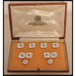 A fantastic 9ct white gold and sapphire gentlemen's cufflink and collar stud set. Each piece of