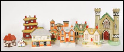 A selection of Staffordshire cottage’s dating from the 19th century to include some money box