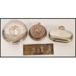A collection of white metal items to include a silver plated sovereign holder, compacts and a