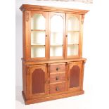 A Victorian 19th century country pine Welsh dresser. Raised on a plinth base with a central bank