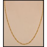 A hallmarked 9ct gold rope twist necklace chain having a bolt ring clasp. Weighs 10.2 grams.