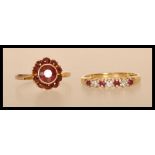Two 20th century ladies rings to include a hallmarked 750 18ct gold ring with inset red and white