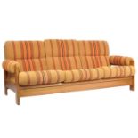 C. D. Pierce & Son LTD - A retro vintage teak wood sofa daybed. The daybed comprising of a teak flat