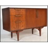 A vintage retro 20th Century teak wood sideboard / credenza, double cupboard with a bank of three