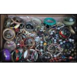A large collection of vintage and contemporary costume jewellery to include bracelets beads,