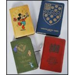 A group of four vintage 20th century money boxes / banks to include Disney Mickey Mouse, Post