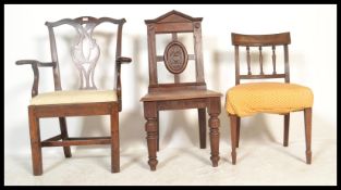 A collection of 3 19th Century chairs to include a Victorian mahogany hall chair with a  carved