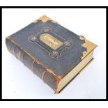 A large early 20th Century edition of 'The Illustrated National Family Bible with the Commentaries