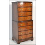 A good quality 20th Century Regency revival flame mahogany bow front tallboy chest of drawers.