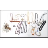 A selection of vintage costume jewellery to include a selection of rhinestone jewellery such as