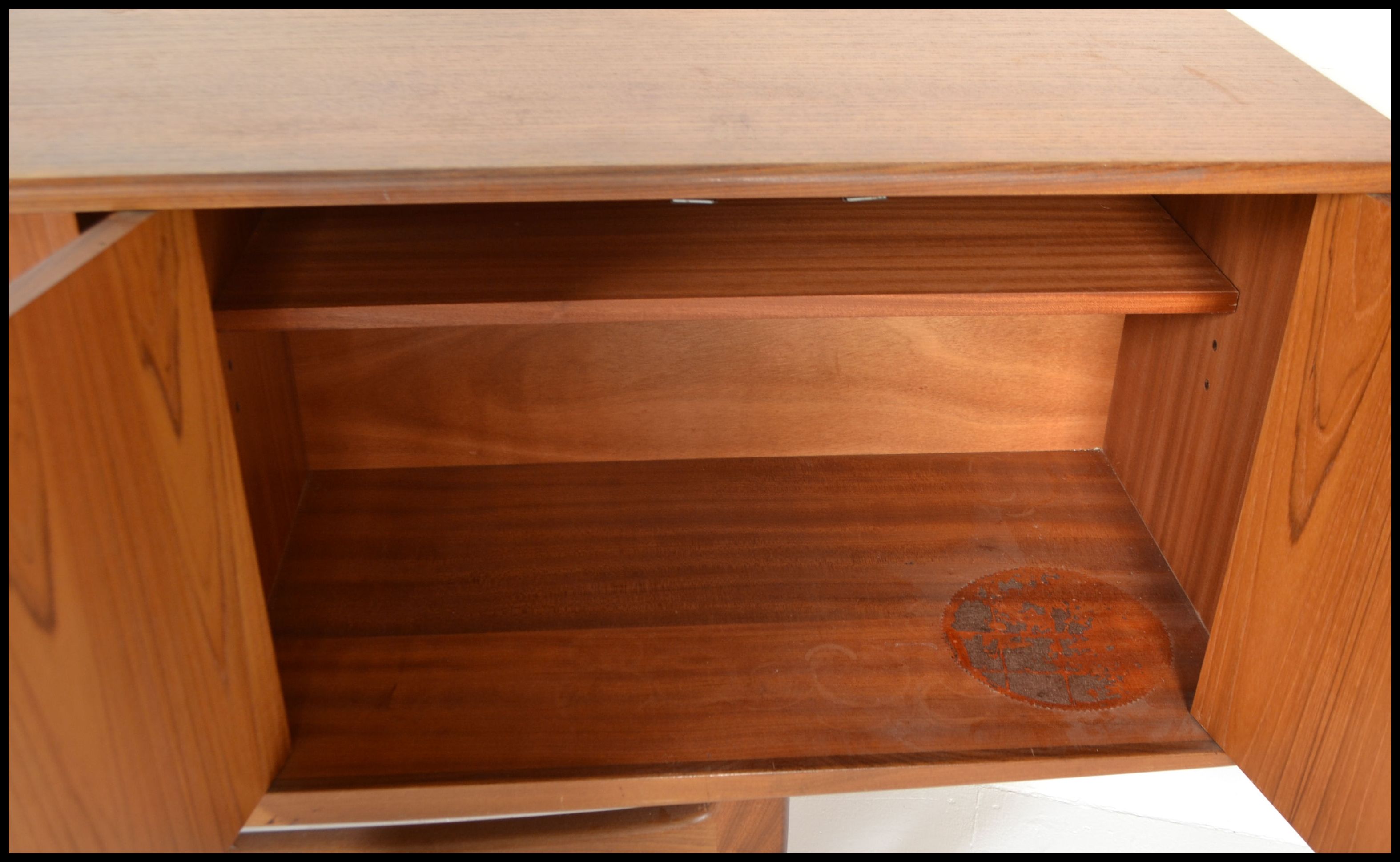 A retro G-Plan teak wood long and low sideboard from the Fresco range, with four central drawers, - Image 7 of 8