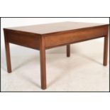 A vintage 20th Century teak wood coffee table by Meredew Associates's, the table fitted with a